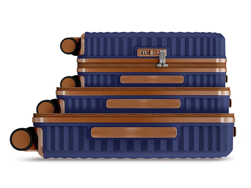 3 hard and expandable travel suitcases