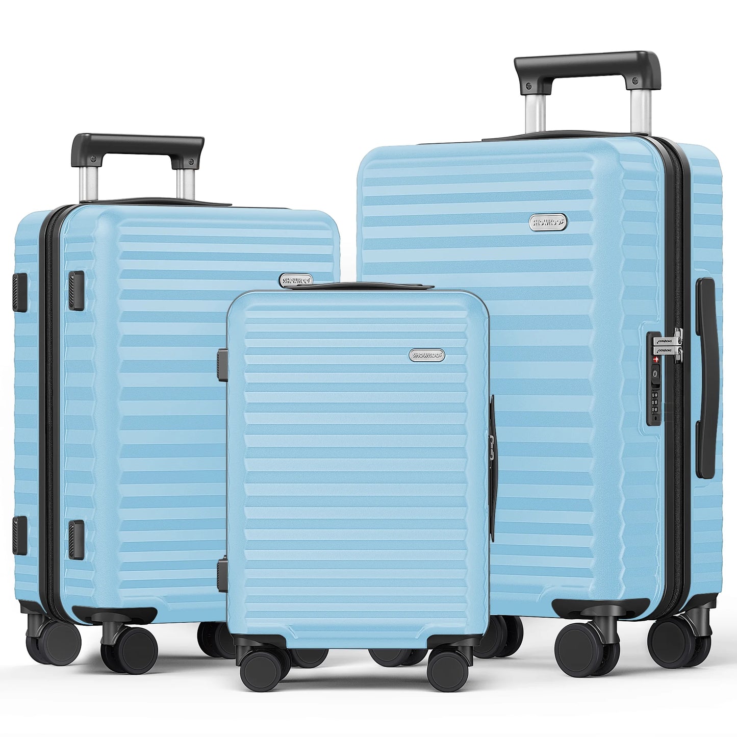 3 hard and expandable travel suitcases