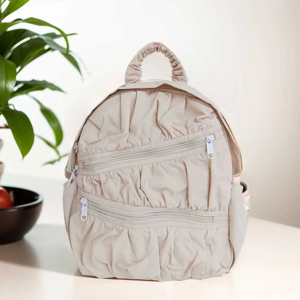 Sac à dos beige de couleur contrastée