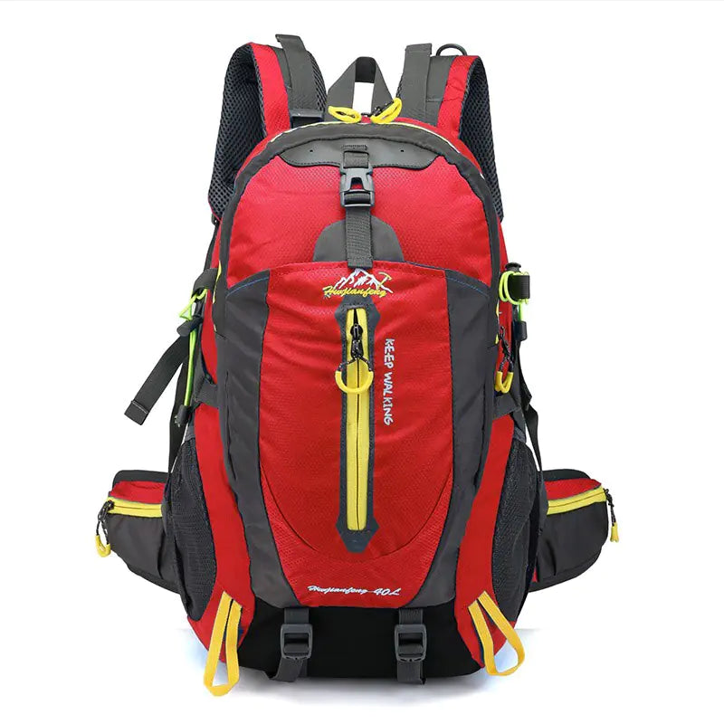 Restez organisé et au sec avec un sac à dos rouge d'escalade imperméable