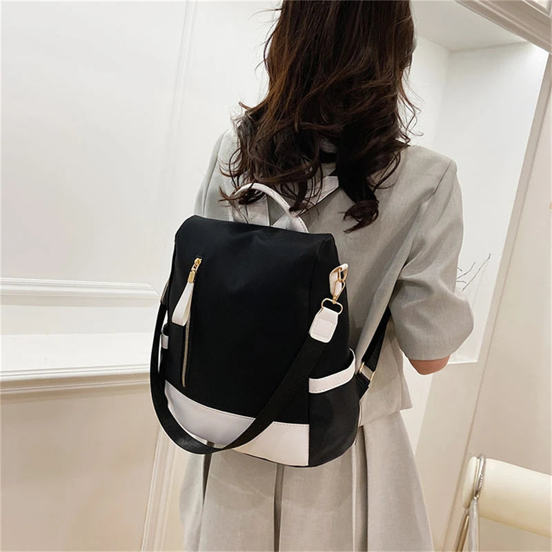 Sac à dos Oxford imperméable avec coutures pour femme, fermeture à glissière arrière antivol, cartable pour fille, voyage décontracté, unique initié