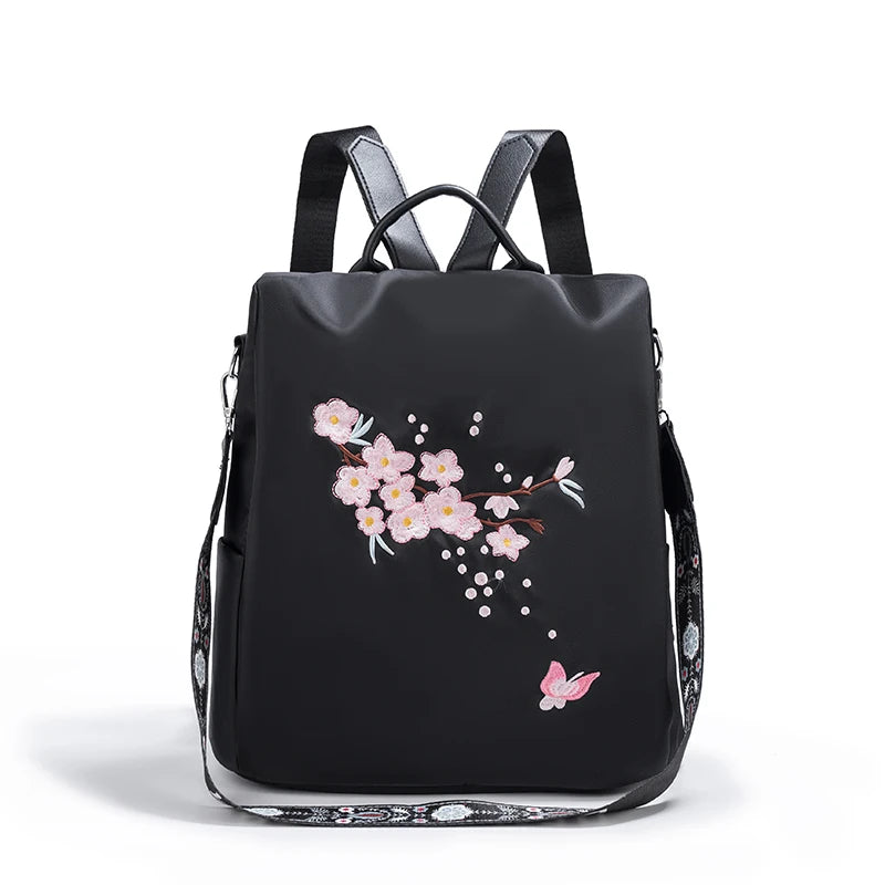 Sac à dos de voyage de loisirs antivol à la mode, tissu Oxford avec broderie de fleurs, sac à dos léger et esthétique pour femmes